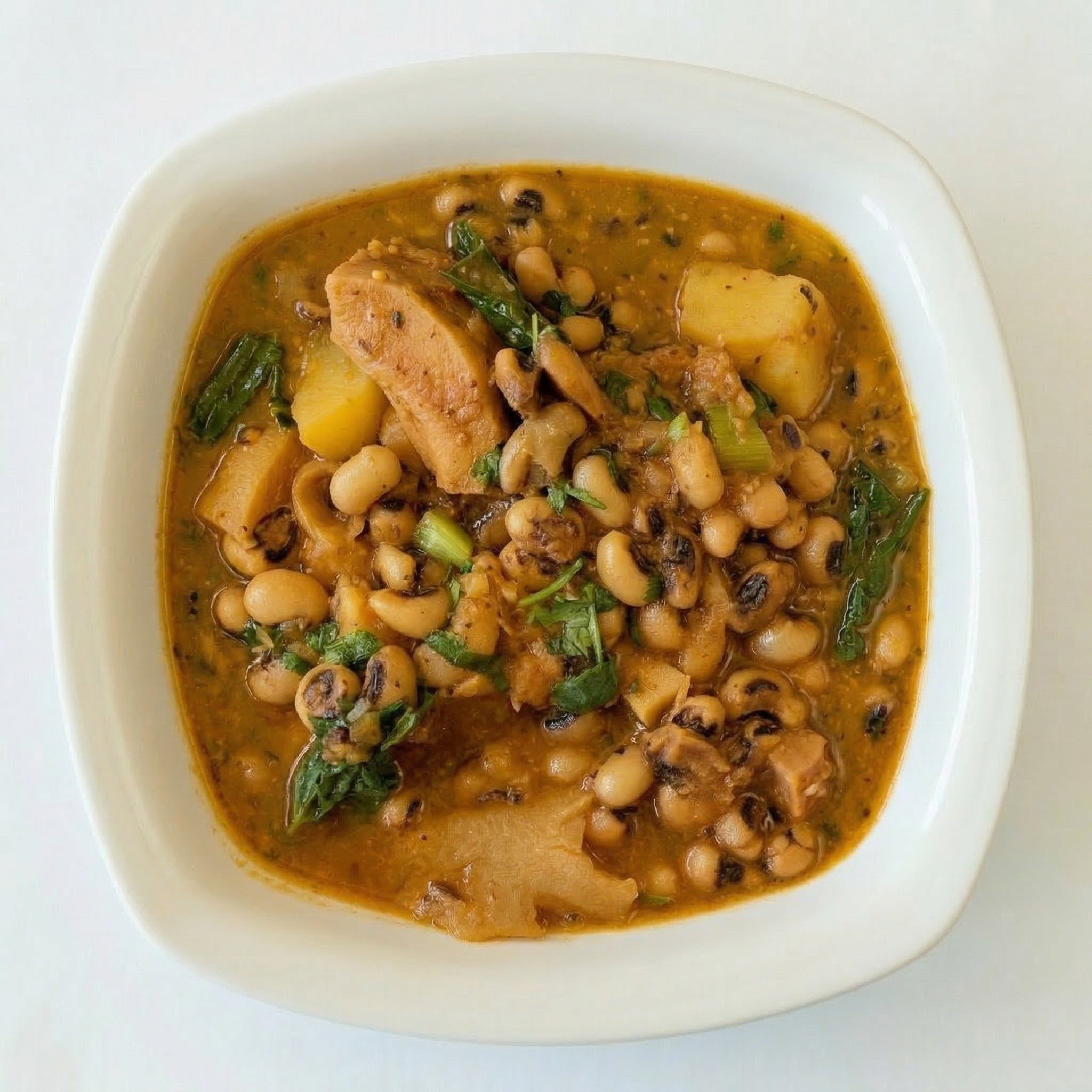 A la Carte Aloo Tama Bodi - Potato Black-Eyed Peas & Bamboo Shoot Curry.